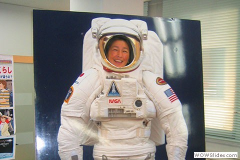 Mie wears spacesuit